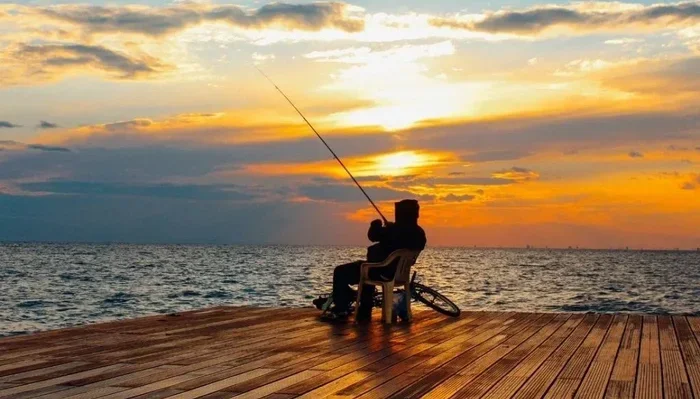 How Do You Hold a Fishing Rod? the Right Way for Beginners (2026)